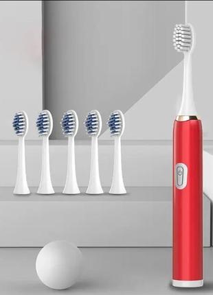 Електрична зубна щітка зі змінними головками1 фото