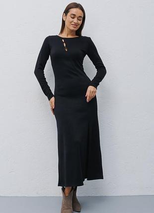 Довга трикотажна сукня чорна з вирізами спереду5 фото