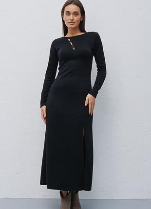 Довга трикотажна сукня чорна з вирізами спереду10 фото