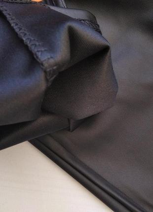Лосины эко-кожа с карманами черный 548 фото