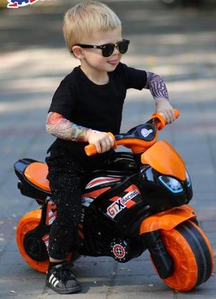 Мотоцикл технок 5767 черный оранжевый каталка детский мотобайк беговел велобег толокар для детей6 фото