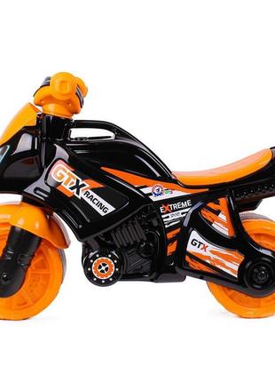Мотоцикл технок 5767 черный оранжевый каталка детский мотобайк беговел велобег толокар для детей4 фото