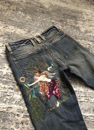 Вінтажні джинси з вишивкою1 фото
