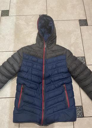 Фирменная зимняя куртка, пуховик с магазина мегаспорт1 фото