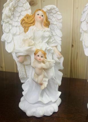 Ангел с детками,статуэтка10 фото
