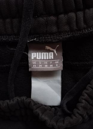 Спортивні штани від puma чорні xs5 фото