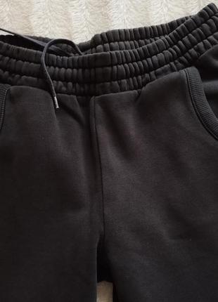 Спортивні штани від puma чорні xs2 фото