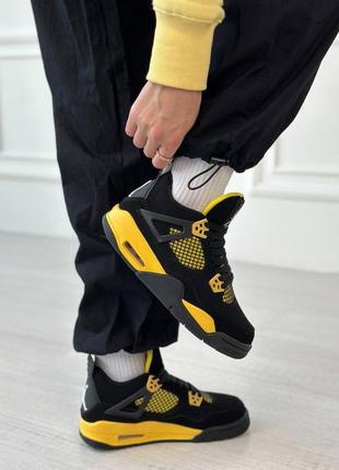 Жіночі кросівки nike air jordan 4 thunder 20234 фото