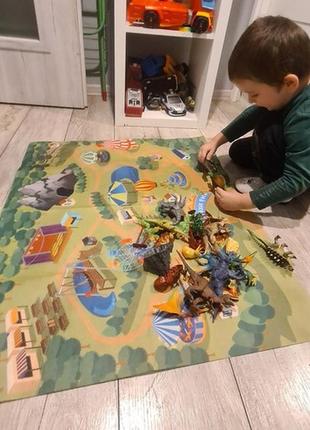 Великий ігровий набір фігурок динозаврів з килимком 24 елементи kruzzel 22397 польща6 фото