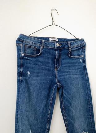 Сині стрейч джинси zara з рваними колінами3 фото