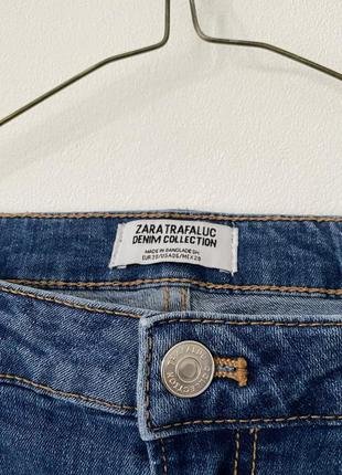 Сині стрейч джинси zara з рваними колінами5 фото