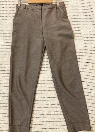 Базові сіро-коричневі штани  у клітку бренду papaya2 фото