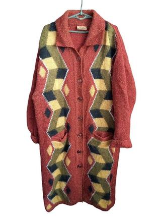 Вязаное женское пальто1 фото