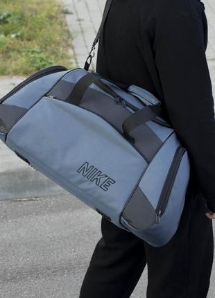 Дорожная спортивная сумка найк на 55 литров серого цвета8 фото