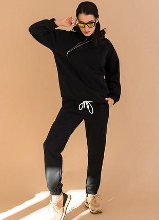 Чорний теплий костюм із блискавкою