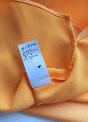 Красивая стильная яркая летняя блуза со спинкой на запах10 фото