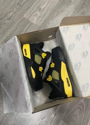 Кросівки jordan 4 thunder4 фото