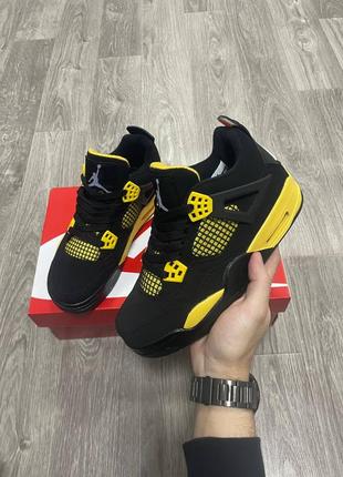 Кросівки jordan 4 thunder7 фото