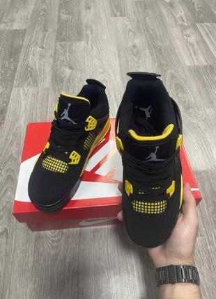 Кросівки jordan 4 thunder3 фото