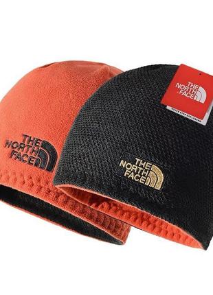 Двусторонняя шапка the north face оранжевый флис + черный трикотаж