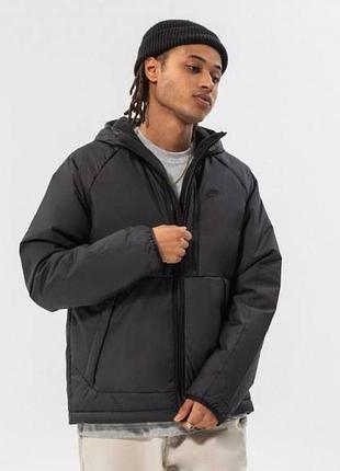 Утеплена куртка nike8 фото