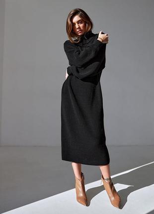 Длинное вязанное платье с поясом черного цвета. модель 2534 trikobakh