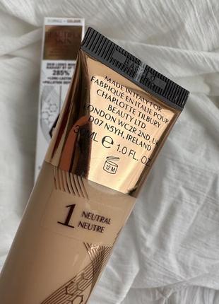 Тональна основа charlotte tilbury charlotte's beautiful skin foundation - 1 neutral3 фото