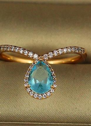 Кольцо  xuping jewelry золушка с голубым камнем р 16 золотистое