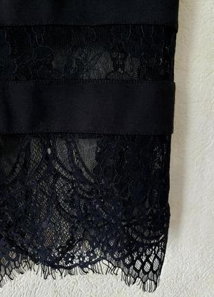 Черная стречевая миди юбка карандаш с кружевной окантовкой 10-12 uk4 фото