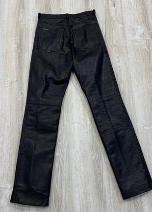 Женские кожаные брюки versace jeans couture5 фото