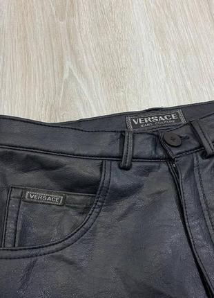 Женские кожаные брюки versace jeans couture4 фото