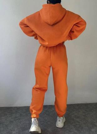 Костюм спортивный женский на флисе оверсайз худи с капишоном штаны джоггеры на высокой посадке с карманами качественный теплый оранжевый оранжевый4 фото