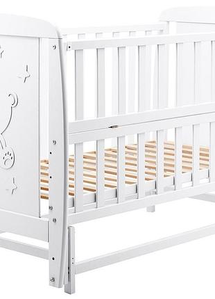 Кровать babyroom умка dumo-02 маятник, откидной бок бук белый1 фото