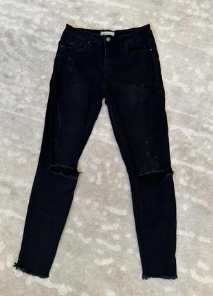 Черные рваные джинсы1 фото