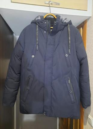 Продам новую зимнюю мужскую куртку1 фото