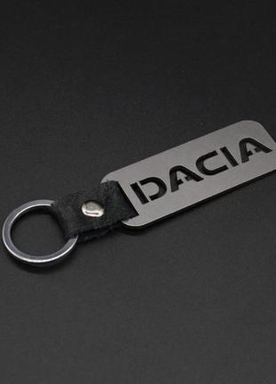 Брелок металевий. dacia. 10х2,5см