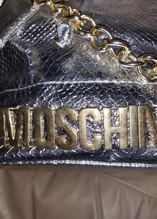 Новый серебристый рюкзак с надписью moschino. распродажа склада3 фото