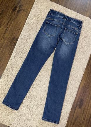 Женские джинсы скинни синего цвета8 фото