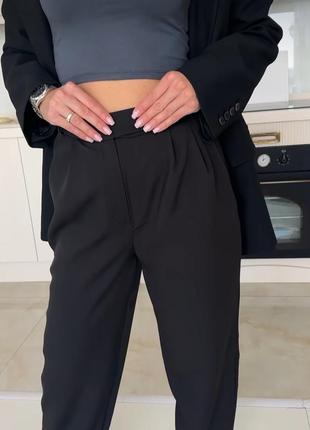 Женские брюки палаццо офисные стильные широкие черные из костюмной ткани (42-44, 44-46)4 фото