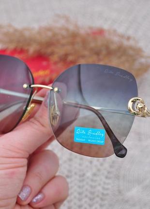 Фирменные безоправные градиентные солнцезащитные очки rita bradley polarized окуляри1 фото