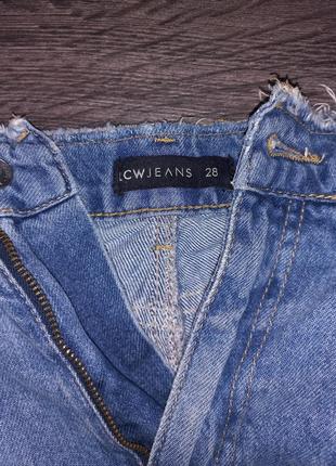 Рваные джинсы мом2 фото