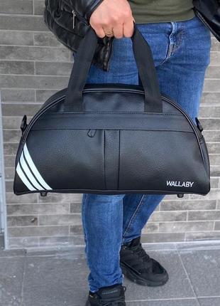 Чорна спортивна овальна сумка повсякденна універсальна чоловіча жіноча1 фото