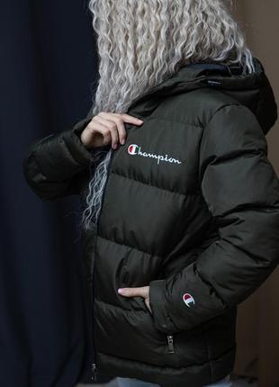 Жіноча зимова куртка champion тепла до -25°с хакі пуховик з капюшоном чемпіон дутий1 фото