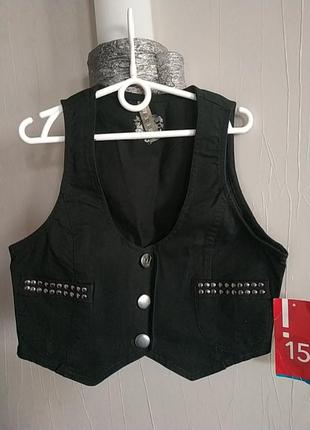 Жилетка на дівчинку