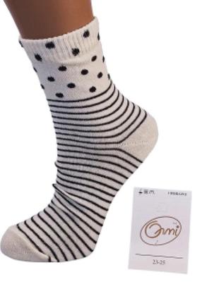 Шкарпетки жіночі середні демісезонні в розмірі 23-25 (36-40 взуття), стрейчеві, з бежевим малюнком2 фото