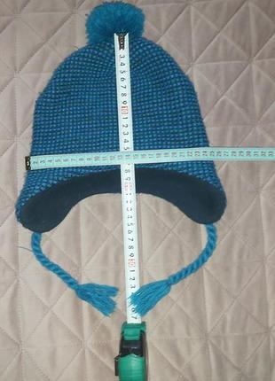 Теплая зимняя шапка