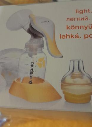 Молокоотсос mebela
