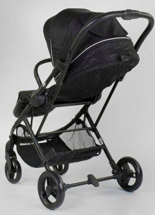 Коляска прогулянкова дитяча з чохлом на ніжки joy liliya 61755, колір чорний8 фото