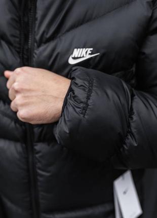Чоловіча куртка чорна nike з капюшоном утеплена з карманами2 фото
