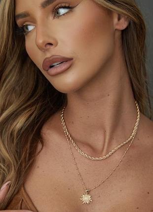 Набір золотих ланцюжків з підсвіткою сонце